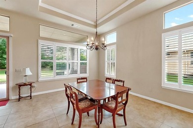 Conveniently located on a corner lot, this Rialta home offers on Wildhorse Golf Club of Robson Ranch in Texas - for sale on GolfHomes.com, golf home, golf lot