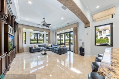 Magnificent custom home in PGCC. This mini mansion offers 6 on Parkland Golf Club in Florida - for sale on GolfHomes.com, golf home, golf lot