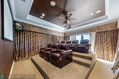 Magnificent custom home in PGCC. This mini mansion offers 6 on Parkland Golf Club in Florida - for sale on GolfHomes.com, golf home, golf lot