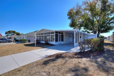 A clean, bright, and inviting manufactured home offering on Lakes of Lady Lake Golf Course in Florida - for sale on GolfHomes.com, golf home, golf lot