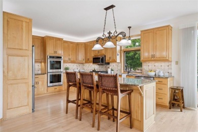 Welcome to your dream home! Perfectly positioned on the 15th on Wild Marsh Golf Club in Minnesota - for sale on GolfHomes.com, golf home, golf lot