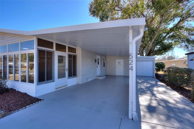 A clean, bright, and inviting manufactured home offering on Lakes of Lady Lake Golf Course in Florida - for sale on GolfHomes.com, golf home, golf lot