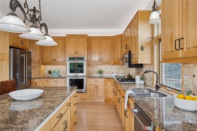 Welcome to your dream home! Perfectly positioned on the 15th on Wild Marsh Golf Club in Minnesota - for sale on GolfHomes.com, golf home, golf lot