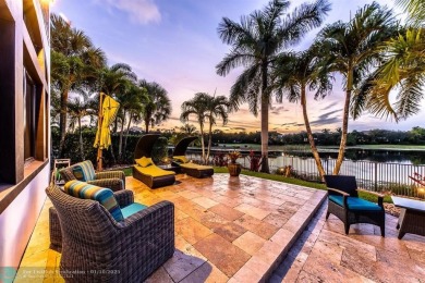 Magnificent custom home in PGCC. This mini mansion offers 6 on Parkland Golf Club in Florida - for sale on GolfHomes.com, golf home, golf lot