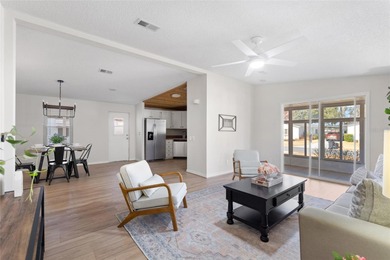 A clean, bright, and inviting manufactured home offering on Lakes of Lady Lake Golf Course in Florida - for sale on GolfHomes.com, golf home, golf lot