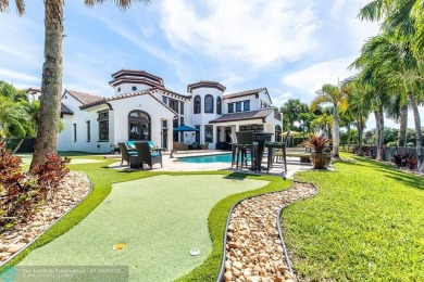 Magnificent custom home in PGCC. This mini mansion offers 6 on Parkland Golf Club in Florida - for sale on GolfHomes.com, golf home, golf lot