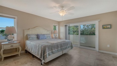 Rarely available 3-bedroom end unit featuring sweeping golf on Palm Aire Country Club of Sarasota in Florida - for sale on GolfHomes.com, golf home, golf lot