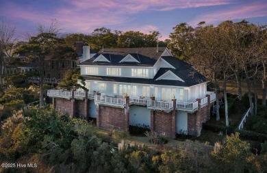 Awake to the tranquil beauty of sunrises over the waterway on Country Club of Landfall in North Carolina - for sale on GolfHomes.com, golf home, golf lot