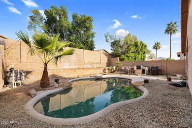 This Ahwatukee Foothills home boasts a pebble-tech pool, 3 on Club West Golf Club in Arizona - for sale on GolfHomes.com, golf home, golf lot