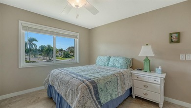 Rarely available 3-bedroom end unit featuring sweeping golf on Palm Aire Country Club of Sarasota in Florida - for sale on GolfHomes.com, golf home, golf lot