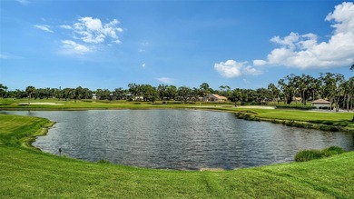 Rarely available 3-bedroom end unit featuring sweeping golf on Palm Aire Country Club of Sarasota in Florida - for sale on GolfHomes.com, golf home, golf lot