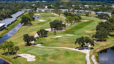 Rarely available 3-bedroom end unit featuring sweeping golf on Palm Aire Country Club of Sarasota in Florida - for sale on GolfHomes.com, golf home, golf lot
