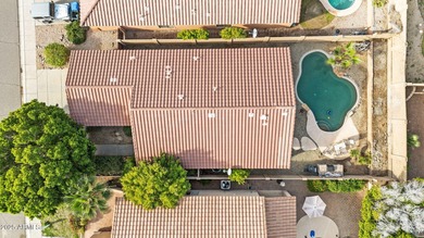 This Ahwatukee Foothills home boasts a pebble-tech pool, 3 on Club West Golf Club in Arizona - for sale on GolfHomes.com, golf home, golf lot