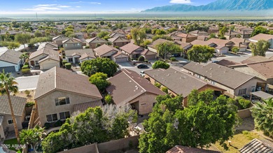 This Ahwatukee Foothills home boasts a pebble-tech pool, 3 on Club West Golf Club in Arizona - for sale on GolfHomes.com, golf home, golf lot