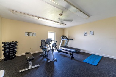 Rarely available 3-bedroom end unit featuring sweeping golf on Palm Aire Country Club of Sarasota in Florida - for sale on GolfHomes.com, golf home, golf lot