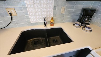 TWO BEDROOM, ONE BATHROOM MOBILE HOME IN AN ACTIVE 55+ COMMUNITY on River Run Golf Links in Florida - for sale on GolfHomes.com, golf home, golf lot