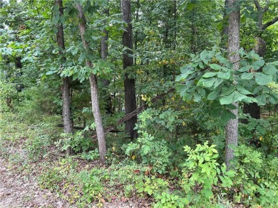 SEWERED access for this lot . Lot is wooded would be nice for a on Bella Vista Country Club and Golf Course in Arkansas - for sale on GolfHomes.com, golf home, golf lot