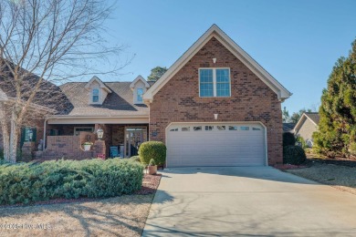 Beautifully crafted brick home situated in the Ashwood on Cape Fear National At Brunswick Forest in North Carolina - for sale on GolfHomes.com, golf home, golf lot