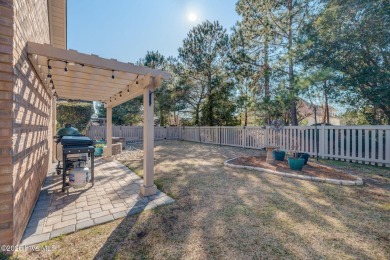 Beautifully crafted brick home situated in the Ashwood on Cape Fear National At Brunswick Forest in North Carolina - for sale on GolfHomes.com, golf home, golf lot