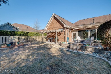 Beautifully crafted brick home situated in the Ashwood on Cape Fear National At Brunswick Forest in North Carolina - for sale on GolfHomes.com, golf home, golf lot