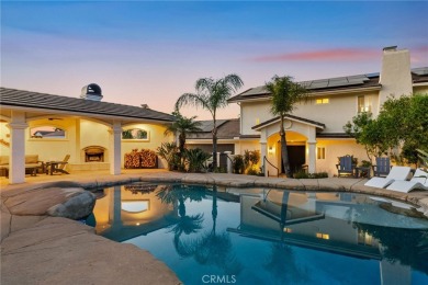 Welcome to 22883 Calcutta Drive, an exquisite retreat nestled on on Canyon Lake Country Club in California - for sale on GolfHomes.com, golf home, golf lot