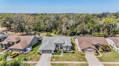 SPACIOUS 3 BEDROOM, 2 BATHROOM HOME ON CONSERVATION LOT IN MAIN on Timber Greens Country Club in Florida - for sale on GolfHomes.com, golf home, golf lot
