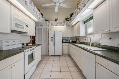 SPACIOUS 3 BEDROOM, 2 BATHROOM HOME ON CONSERVATION LOT IN MAIN on Timber Greens Country Club in Florida - for sale on GolfHomes.com, golf home, golf lot