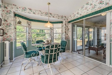 SPACIOUS 3 BEDROOM, 2 BATHROOM HOME ON CONSERVATION LOT IN MAIN on Timber Greens Country Club in Florida - for sale on GolfHomes.com, golf home, golf lot