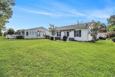 Welcome Home! This beautifully maintained 2-bedroom, 2-bathroom on Burning Ridge Golf Course in South Carolina - for sale on GolfHomes.com, golf home, golf lot