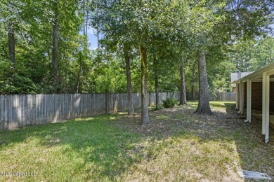 WIde open spaces is the thought that comes to mind inside this on Diamondhead Country Club in Mississippi - for sale on GolfHomes.com, golf home, golf lot