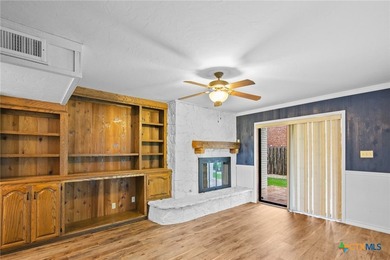 Welcome to this beautifully maintained Spanish-style two-story on Victoria Country Club in Texas - for sale on GolfHomes.com, golf home, golf lot