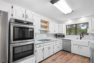 Welcome to this beautifully maintained Spanish-style two-story on Victoria Country Club in Texas - for sale on GolfHomes.com, golf home, golf lot