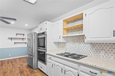 Welcome to this beautifully maintained Spanish-style two-story on Victoria Country Club in Texas - for sale on GolfHomes.com, golf home, golf lot