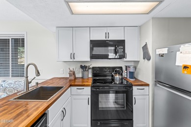 Renovated Smoky Mountain condo with panoramic mountain and gold on Bent Creek Golf Course in Tennessee - for sale on GolfHomes.com, golf home, golf lot