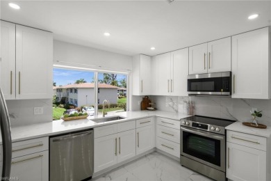This beautifully renovated residence offers a seamless blend of on The Glades Golf and Country Club in Florida - for sale on GolfHomes.com, golf home, golf lot