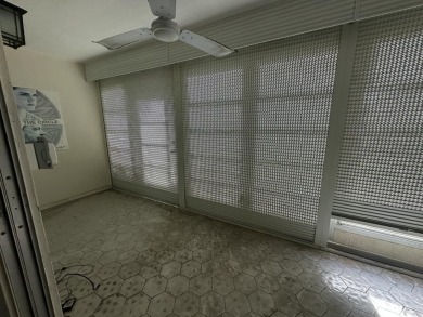 Fix & Flip Opportunity - Corner Unit in Martinique Court on Wynmoor Golf Course in Florida - for sale on GolfHomes.com, golf home, golf lot