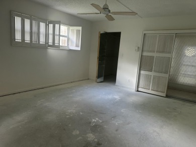 Fix & Flip Opportunity - Corner Unit in Martinique Court on Wynmoor Golf Course in Florida - for sale on GolfHomes.com, golf home, golf lot