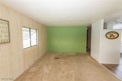 Welcome to this remodeled corner lot home, where modern updates on Six Lakes Country Club in Florida - for sale on GolfHomes.com, golf home, golf lot