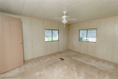 Welcome to this remodeled corner lot home, where modern updates on Six Lakes Country Club in Florida - for sale on GolfHomes.com, golf home, golf lot