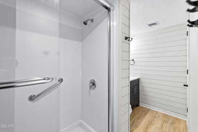 Renovated Smoky Mountain condo with panoramic mountain and gold on Bent Creek Golf Course in Tennessee - for sale on GolfHomes.com, golf home, golf lot