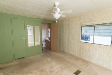 Welcome to this remodeled corner lot home, where modern updates on Six Lakes Country Club in Florida - for sale on GolfHomes.com, golf home, golf lot
