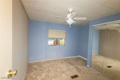 Welcome to this remodeled corner lot home, where modern updates on Six Lakes Country Club in Florida - for sale on GolfHomes.com, golf home, golf lot