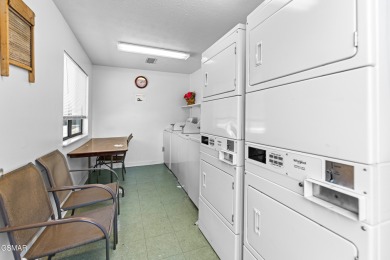 Renovated Smoky Mountain condo with panoramic mountain and gold on Bent Creek Golf Course in Tennessee - for sale on GolfHomes.com, golf home, golf lot