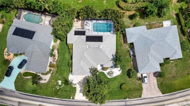 This Custom Built 4 bedroom 2 bath pool home is beautifully on Fountain Lakes Community Golf Course in Florida - for sale on GolfHomes.com, golf home, golf lot