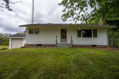 This perfectly located home sits on 15 acres close to Castle on Castle Rock Golf and Country Club in Wisconsin - for sale on GolfHomes.com, golf home, golf lot