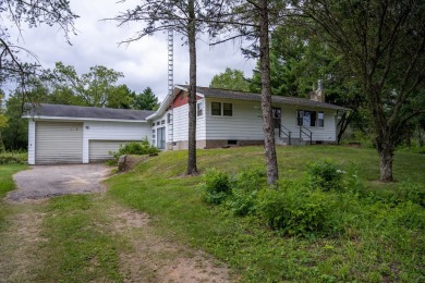 This perfectly located home sits on 15 acres close to Castle on Castle Rock Golf and Country Club in Wisconsin - for sale on GolfHomes.com, golf home, golf lot