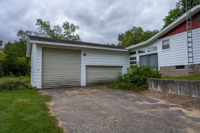 This perfectly located home sits on 15 acres close to Castle on Castle Rock Golf and Country Club in Wisconsin - for sale on GolfHomes.com, golf home, golf lot