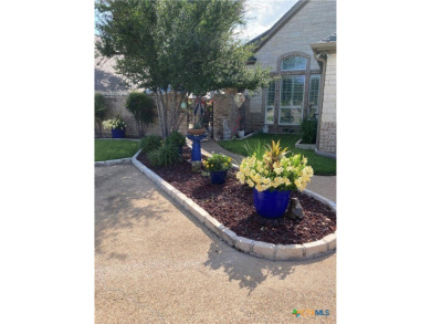 Wonderful country club location, custom built courtyard home on on Wildflower Country Club in Texas - for sale on GolfHomes.com, golf home, golf lot