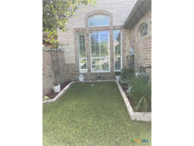 Wonderful country club location, custom built courtyard home on on Wildflower Country Club in Texas - for sale on GolfHomes.com, golf home, golf lot
