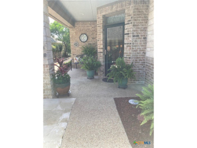Wonderful country club location, custom built courtyard home on on Wildflower Country Club in Texas - for sale on GolfHomes.com, golf home, golf lot